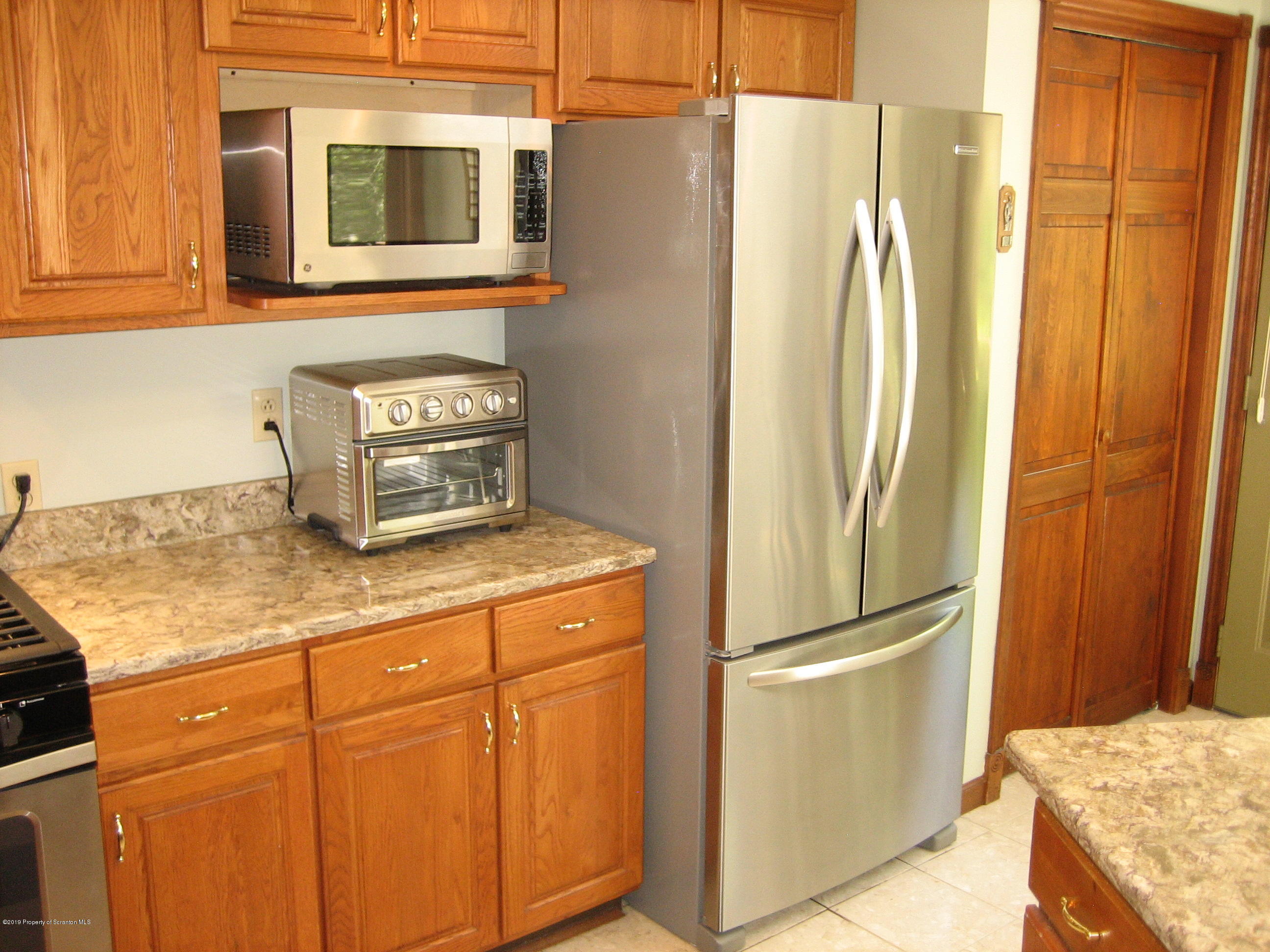 78 D Aberdeen Road Moscow, PA 18444 - Photo 8 of 70 a kitchen with stainless steel appliances granite countertop a refrigerator and a stove
