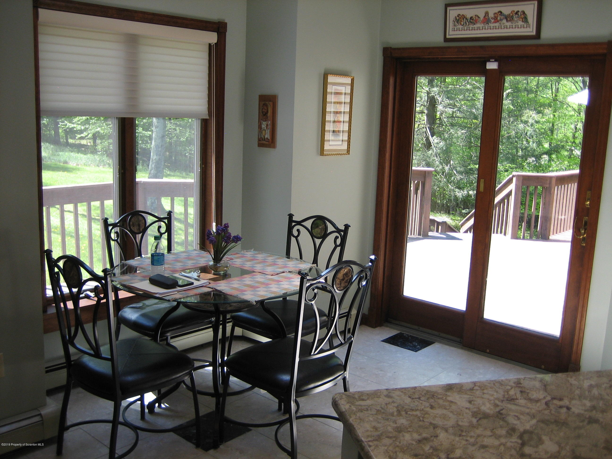 78 D Aberdeen Road Moscow, PA 18444 - Photo 10 of 70 a view of a dining room with furniture window and outside view
