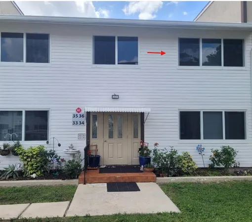 a front view of house with yard