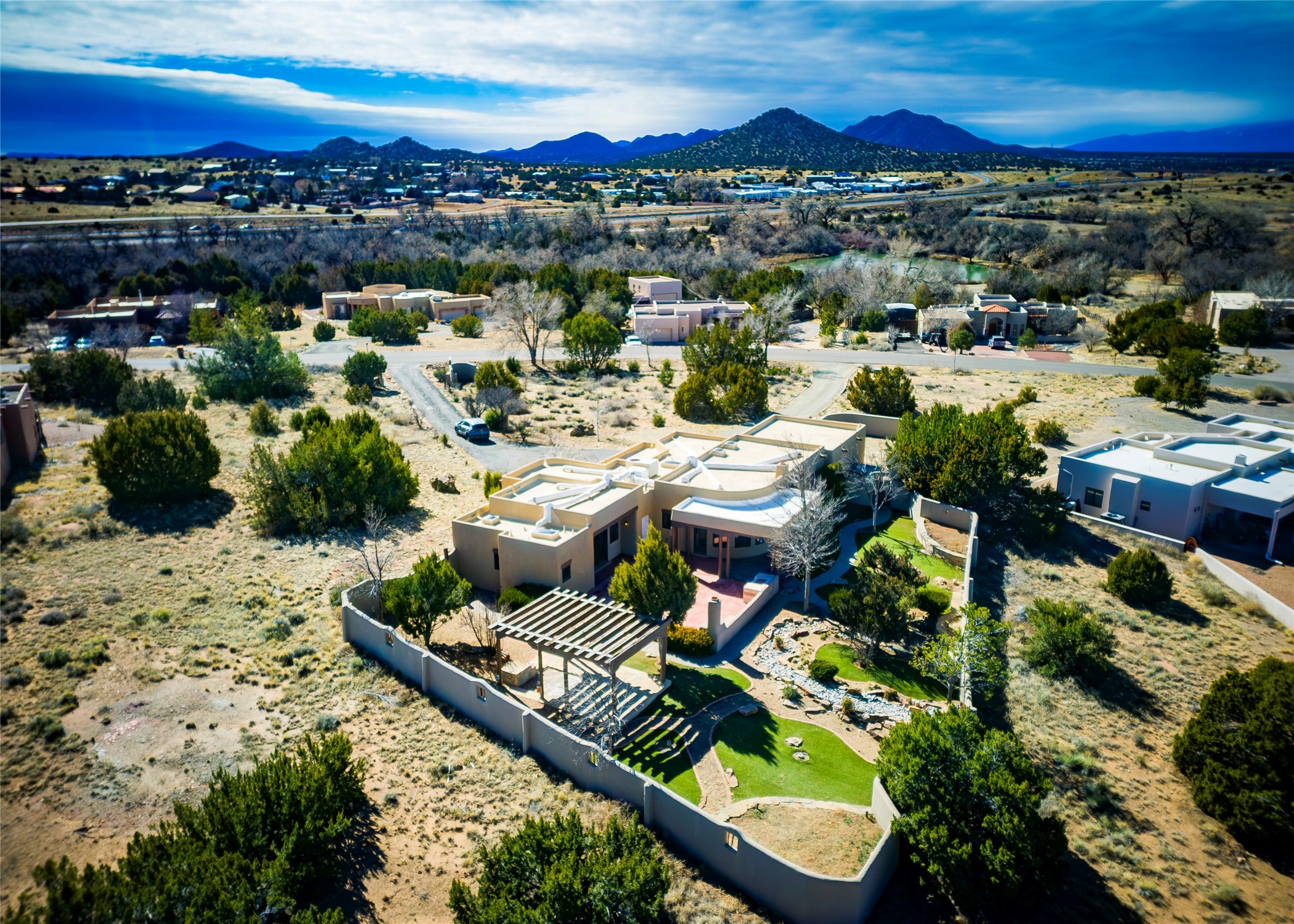 51 Rito Guicu Santa Fe, NM 87507 - Photo 5 of 62 Subject Property with Pond in the Background