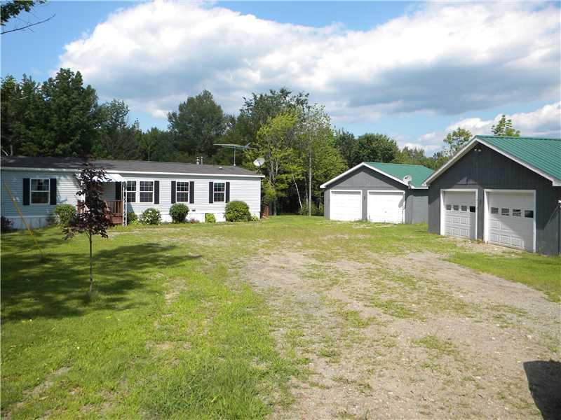 86 Mile Hill Road New Sharon, ME 04955 - Photo 1 of 22 Exterior Front.