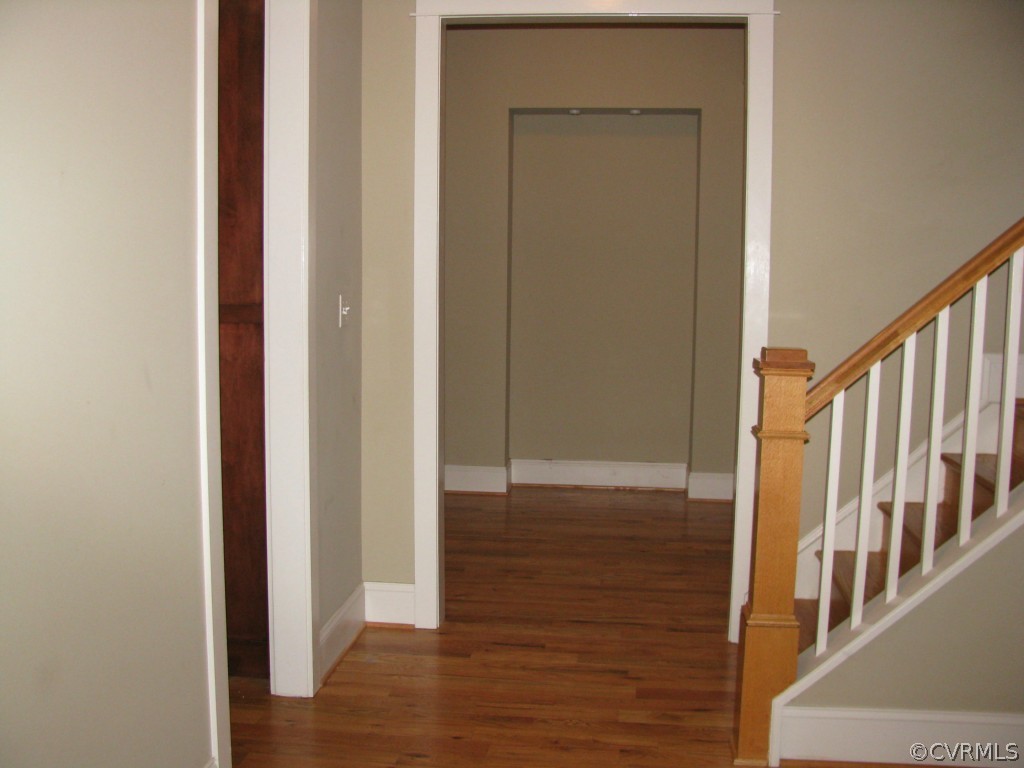 15925 Alsdell Road Midlothian, VA 23112 - Photo 8 of 22 a view of a hallway with wooden floor