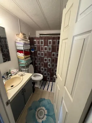 a room with gym equipment and a large window