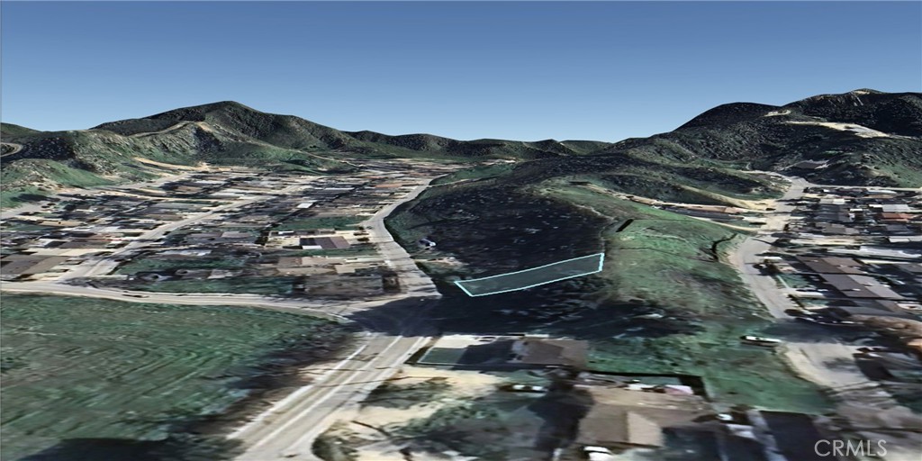 0 Hunstock Street Val Verde, CA 91384 - Photo 11 of 12 a view of a mountain with a field