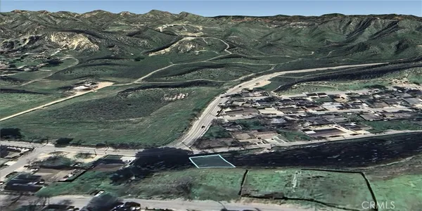 a view of a backyard of a house