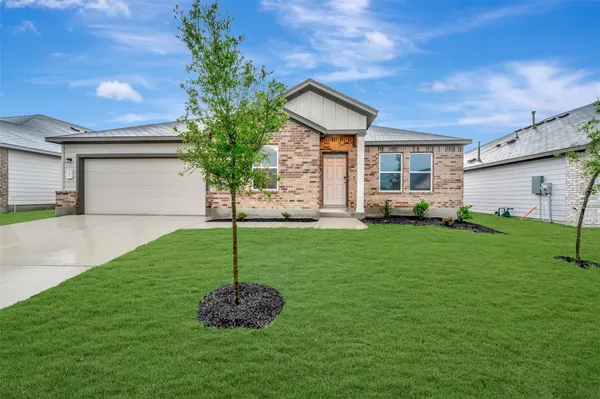 a house view with a garden space