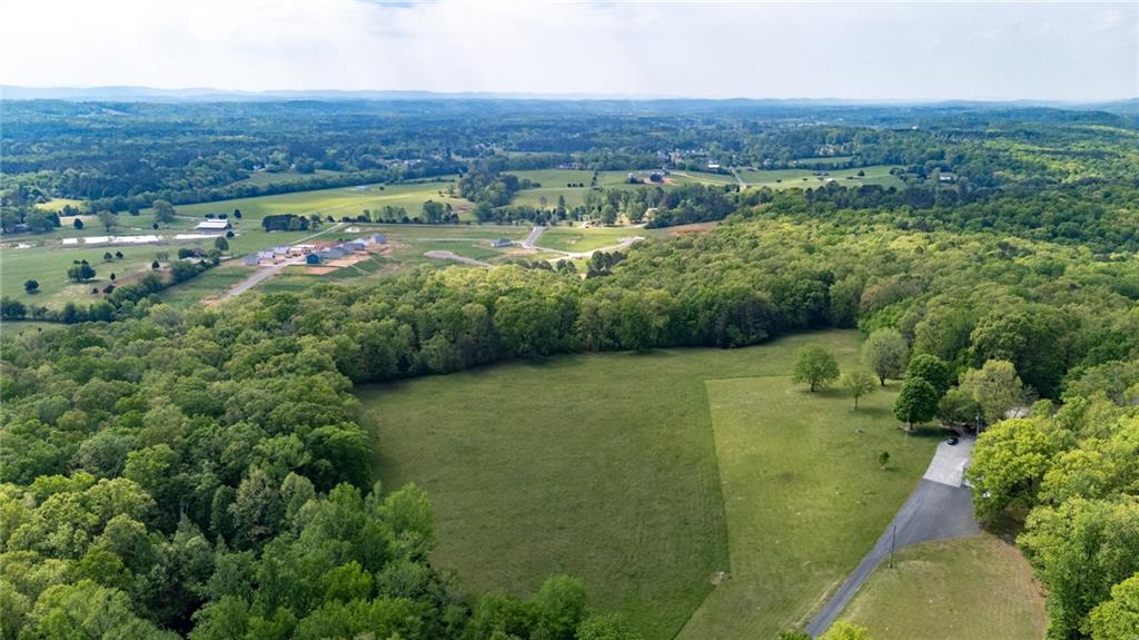 0 Bicentennial Trail Rock Spring, GA 30739 - Photo 4 of 24 an aerial view of a house with a yard
