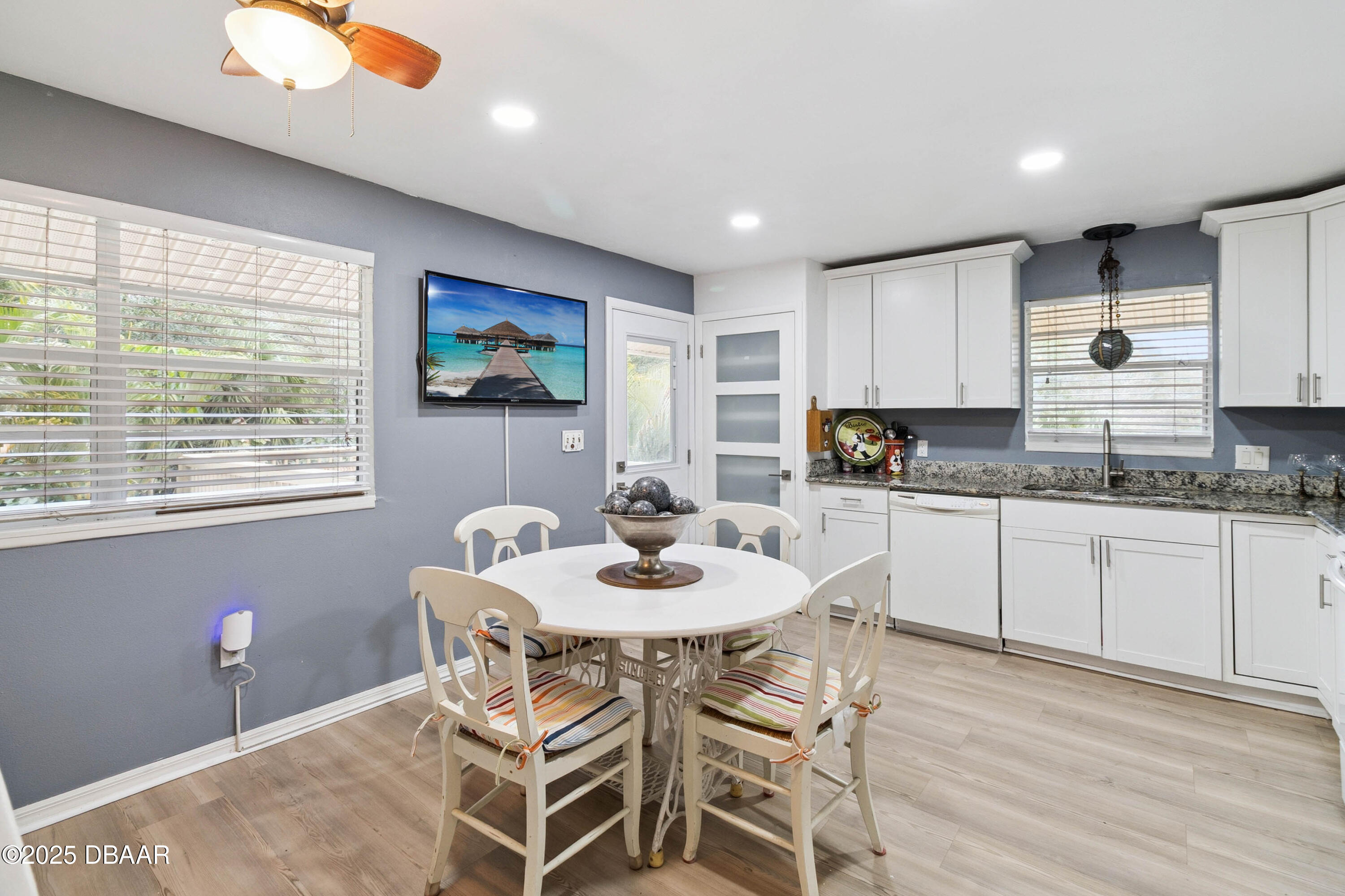 4191 Corey Road Grant Valkaria, FL 32950 - Photo 18 of 55 a dining room with furniture and window