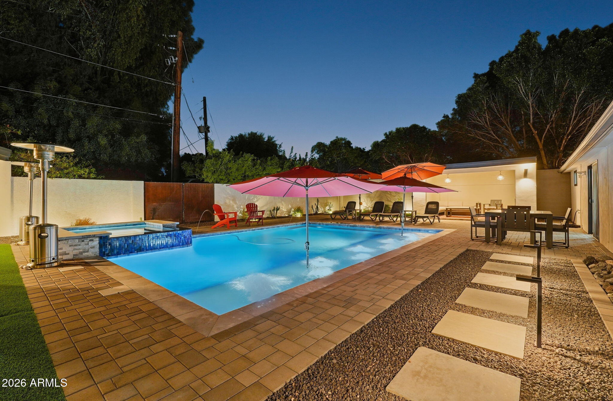 5149 North 34th Street Phoenix, AZ 85018 - Photo 58 of 70 a view of swimming pool with seating area and trees