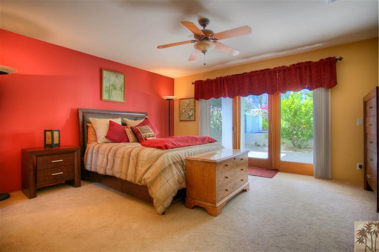 71339 Sahara Road Rancho Mirage, CA 92270 - Photo 13 of 18 a bedroom with a bed and a large window