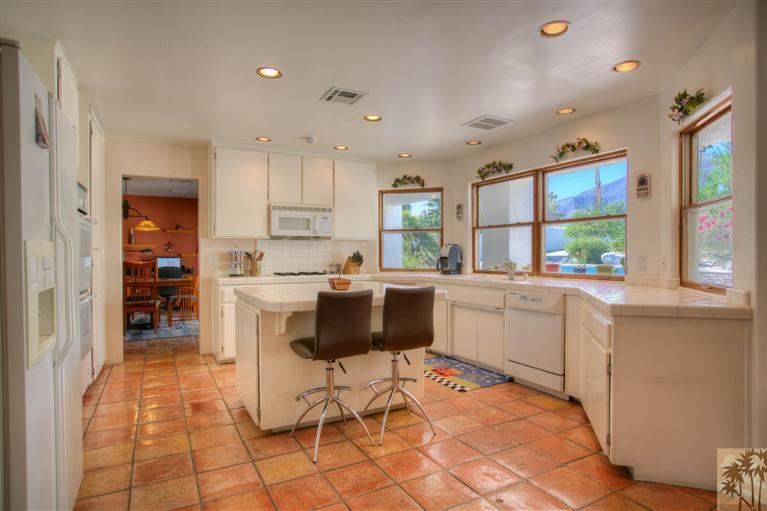 71339 Sahara Road Rancho Mirage, CA 92270 - Photo 7 of 18 a kitchen with a sink cabinets and window