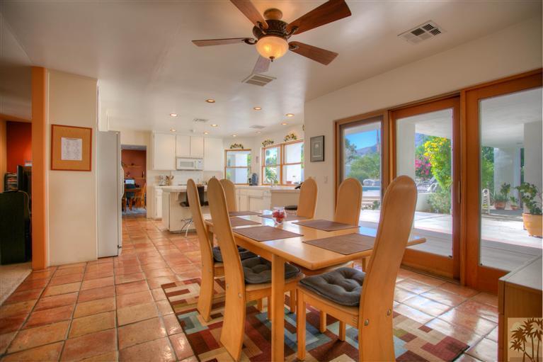 71339 Sahara Road Rancho Mirage, CA 92270 - Photo 8 of 18 a view of a dining room with furniture