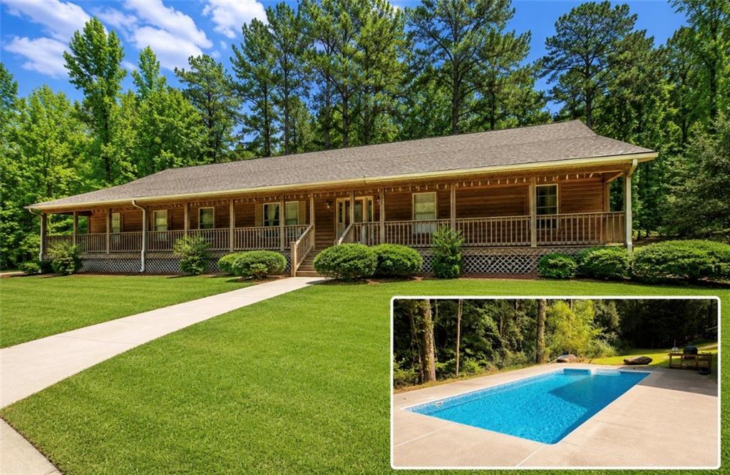 7505 Hall Road Fairburn, GA 30213 - Photo 1 of 43 a view of house with outdoor space and seating area