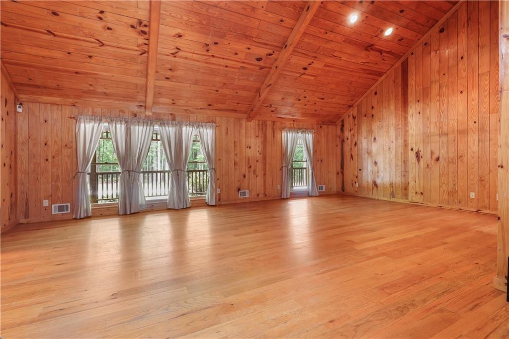7505 Hall Road Fairburn, GA 30213 - Photo 13 of 43 a view of a room with wooden floors