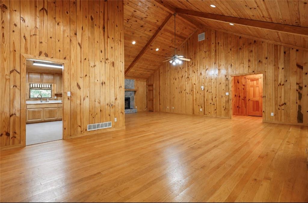 7505 Hall Road Fairburn, GA 30213 - Photo 14 of 43 a view of a livingroom with wooden floor