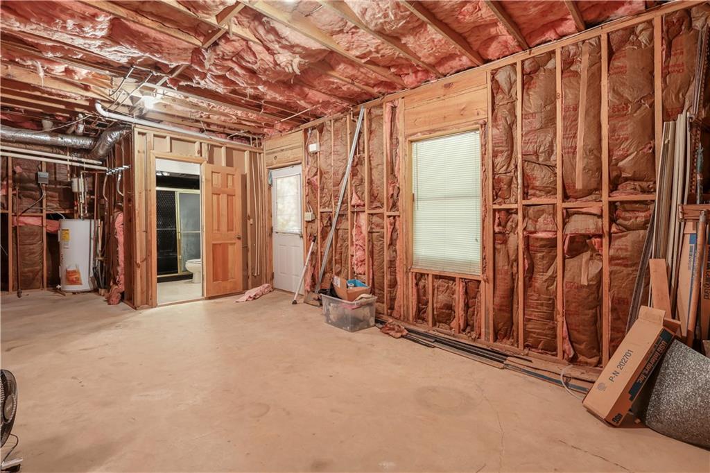 7505 Hall Road Fairburn, GA 30213 - Photo 32 of 43 a view of an empty room with wooden walls