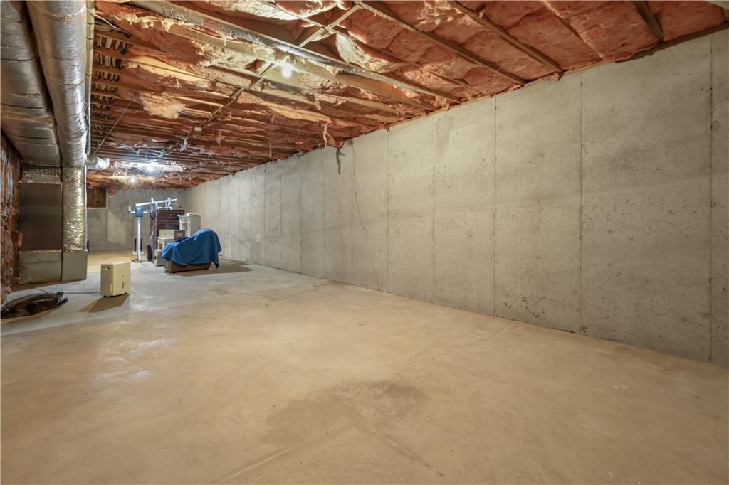 7505 Hall Road Fairburn, GA 30213 - Photo 34 of 43 a view of a room with wooden walls