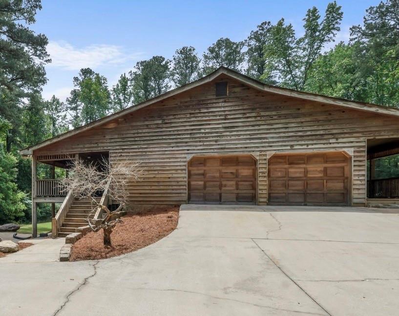 7505 Hall Road Fairburn, GA 30213 - Photo 6 of 43 a view of a house with garage
