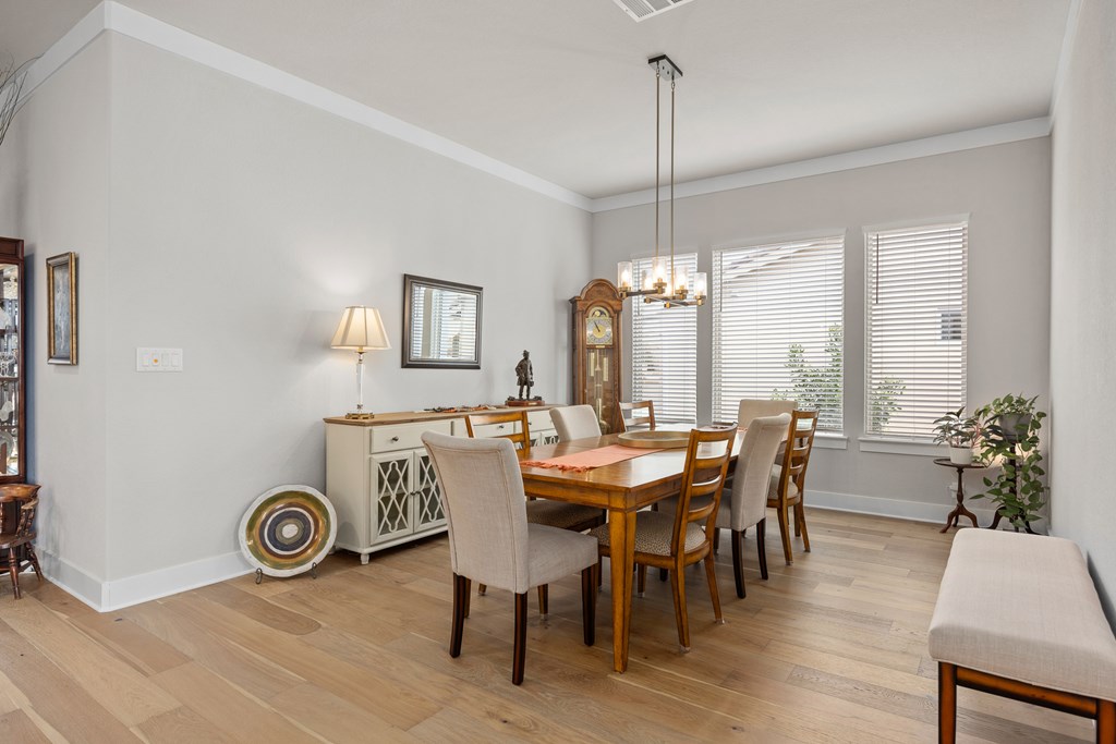 2085 Toscano Way Kerrville, TX 78028 - Photo 13 of 36 a view of a dining room with furniture window and outside view