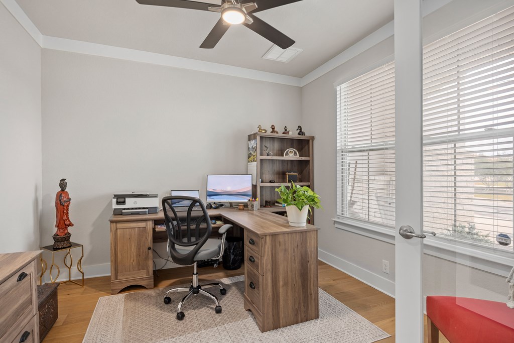 2085 Toscano Way Kerrville, TX 78028 - Photo 14 of 36 a view of a workspace with furniture and a window
