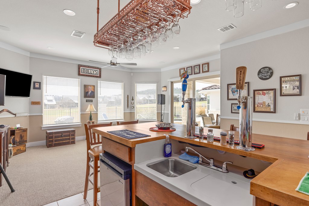 2085 Toscano Way Kerrville, TX 78028 - Photo 16 of 36 a room with furniture pool table and flat screen tv