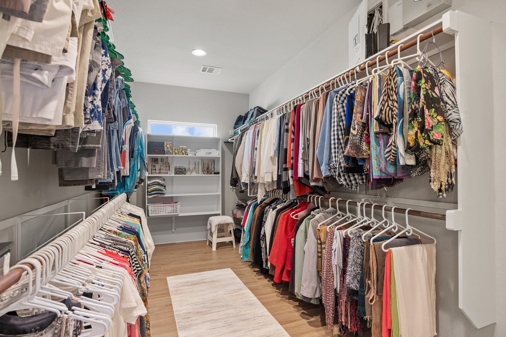 2085 Toscano Way Kerrville, TX 78028 - Photo 22 of 36 a view of walk in closet with clothes