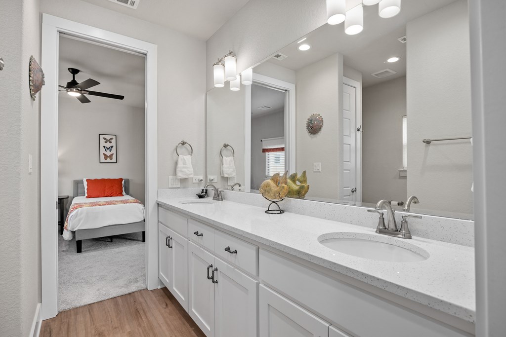 2085 Toscano Way Kerrville, TX 78028 - Photo 25 of 36 a bathroom with a double vanity sink double and mirror