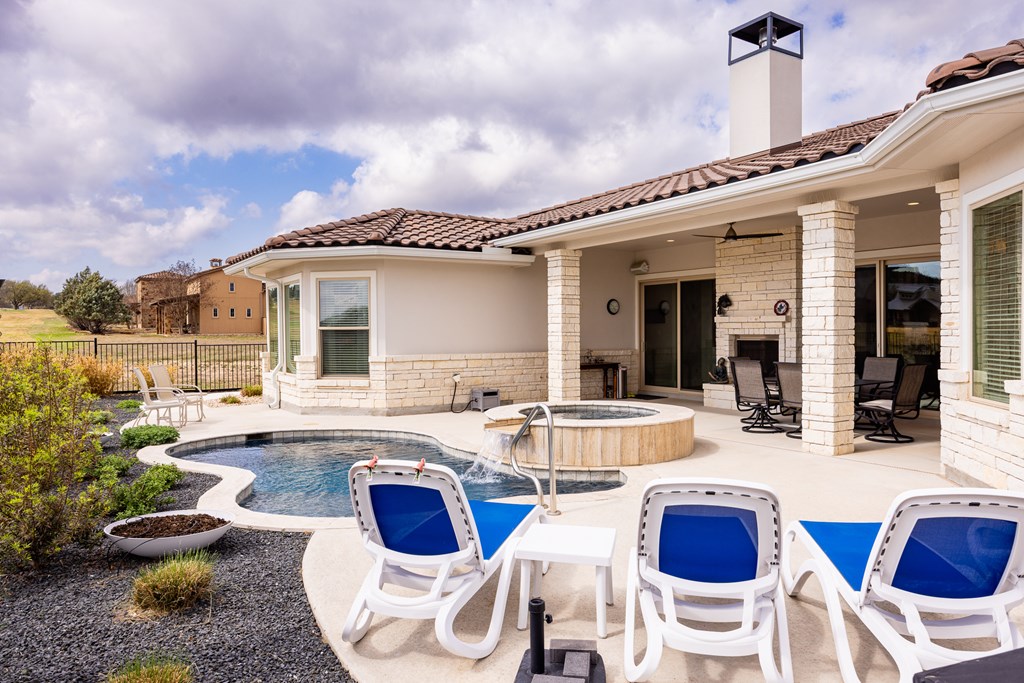 2085 Toscano Way Kerrville, TX 78028 - Photo 33 of 36 a view of a patio with swimming pool table and chairs