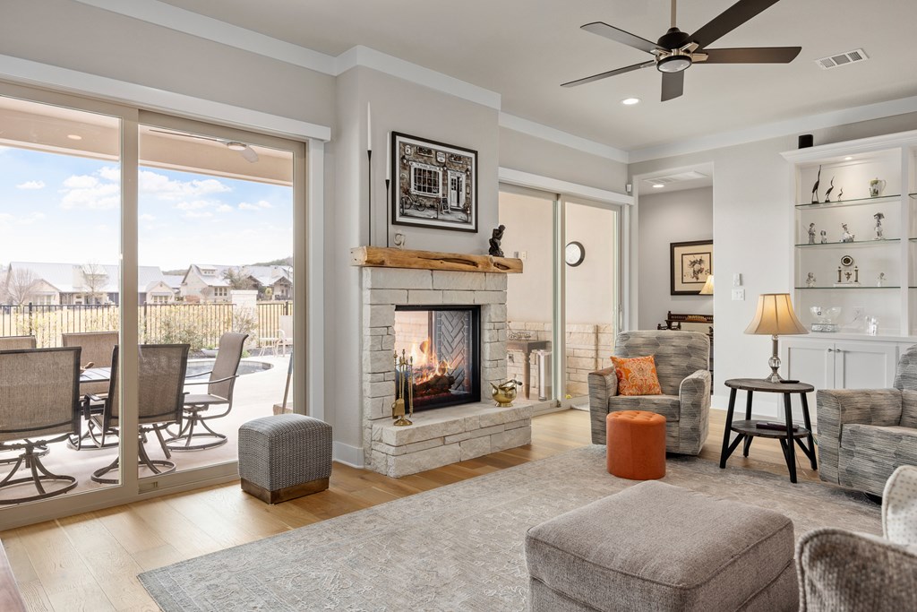 2085 Toscano Way Kerrville, TX 78028 - Photo 4 of 36 a living room with furniture large window and a table