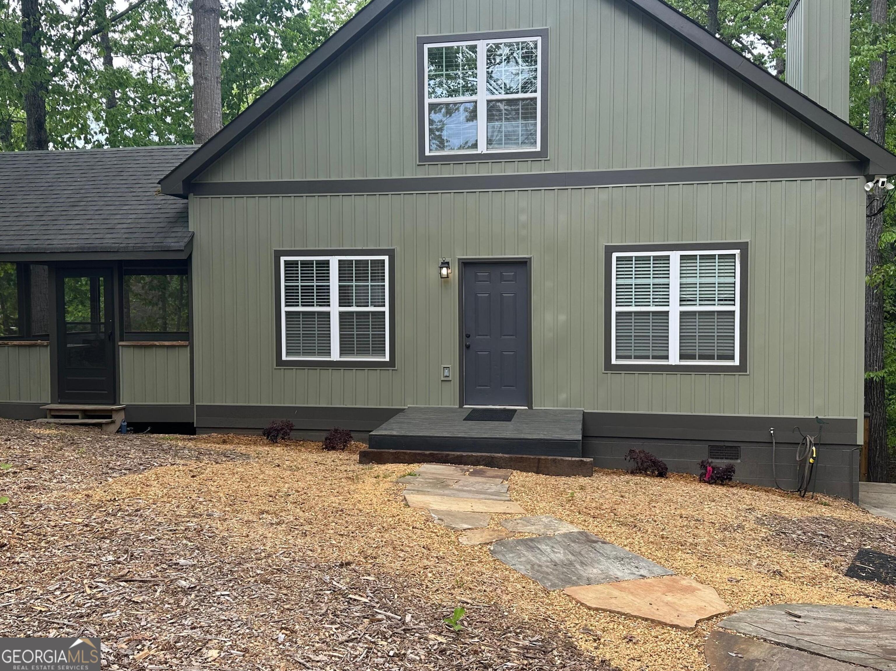 3114 The Trail Road Gainesville, GA 30501 - Photo 2 of 32 a front view of a house