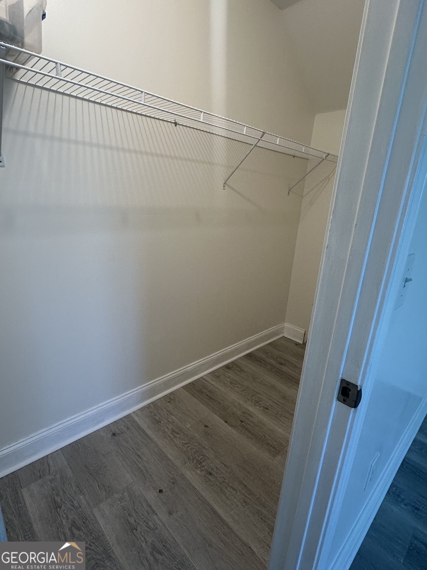 3114 The Trail Road Gainesville, GA 30501 - Photo 24 of 32 a view of a room with wooden floor