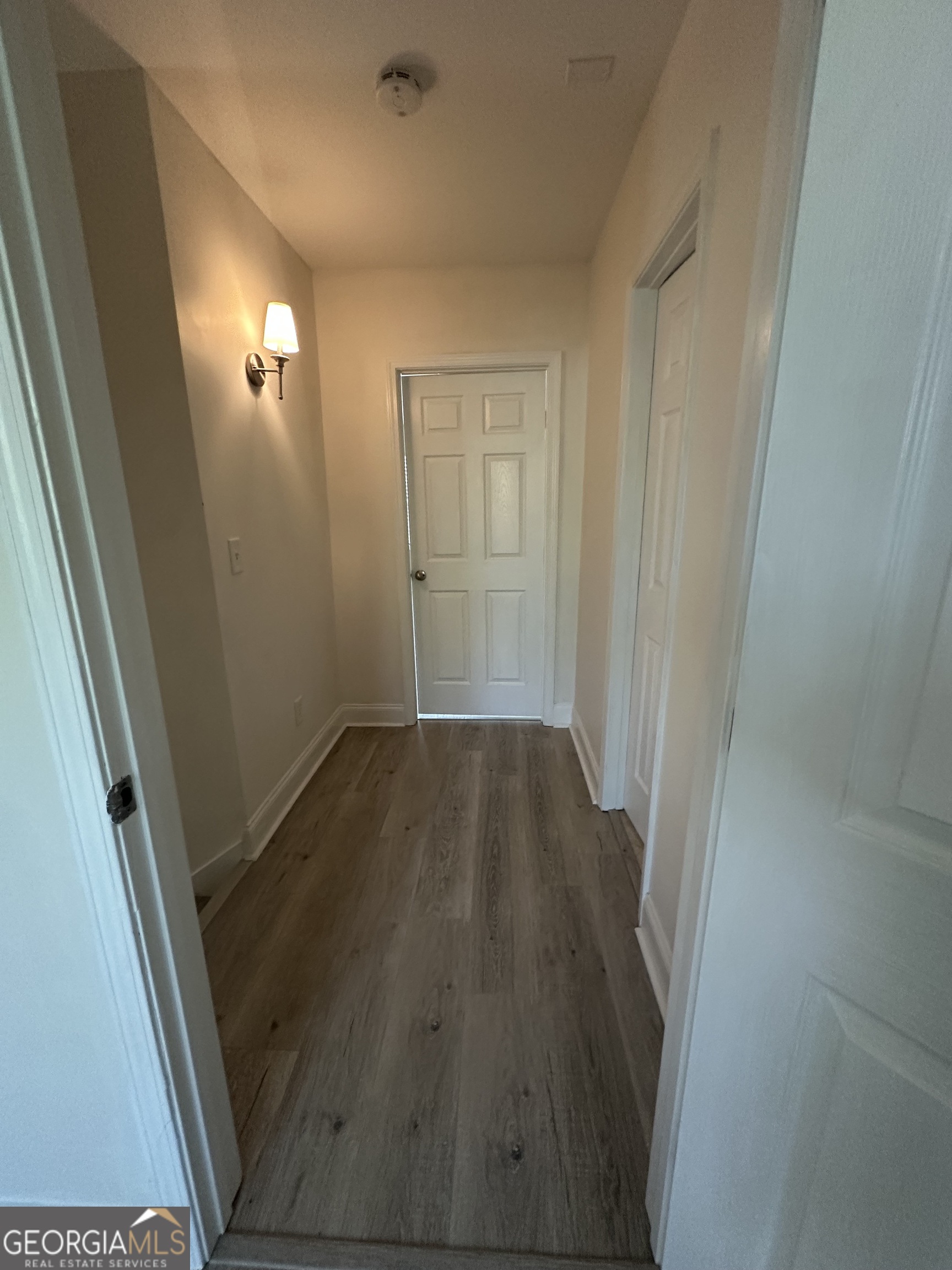 3114 The Trail Road Gainesville, GA 30501 - Photo 27 of 32 an entryway door with wooden floor