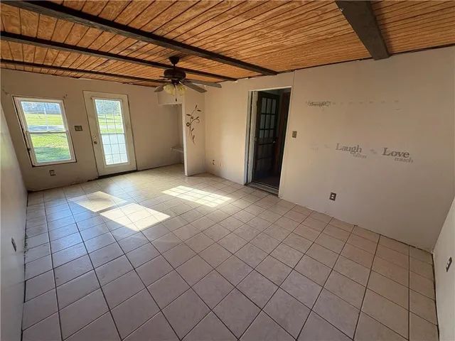 an empty room with windows