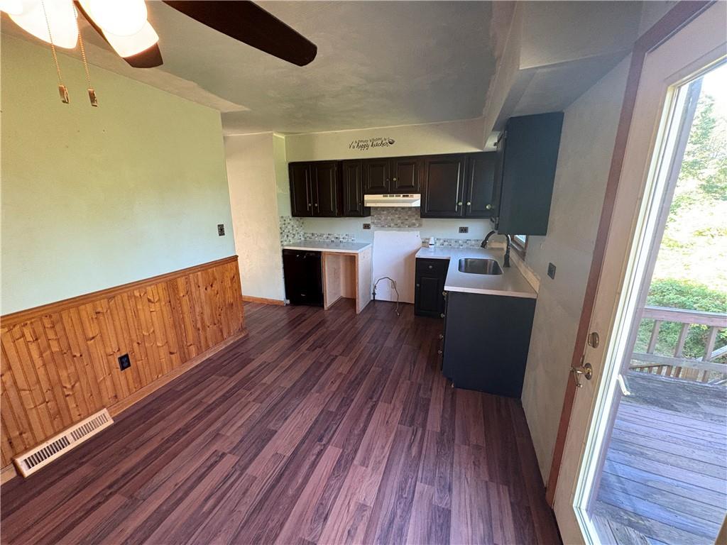 581 Yates Road Punxsutawney, PA 15767 - Photo 7 of 24 a living room with stainless steel appliances wooden floors and wooden floors
