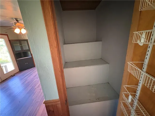 a view of an empty room and window