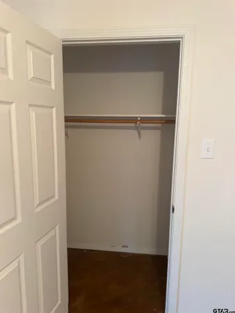 front view of a house and a yard