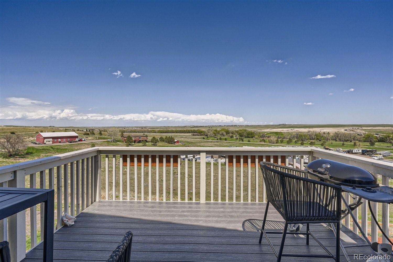 4718 River Highlands Loop Elizabeth, CO 80107 - Photo 25 of 28 a view of roof deck with seating space