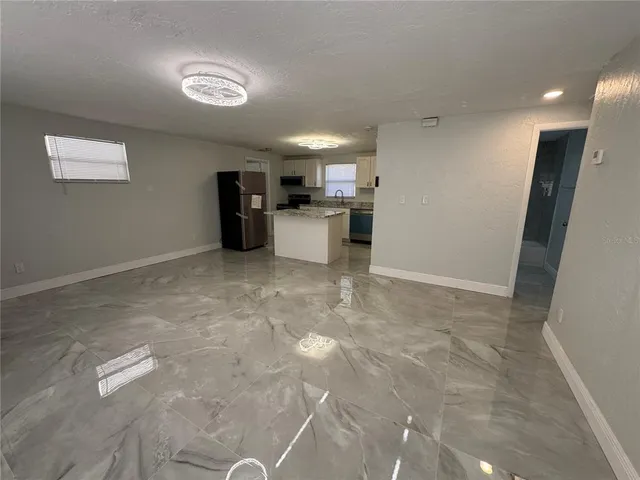 a view of a kitchen with a sink