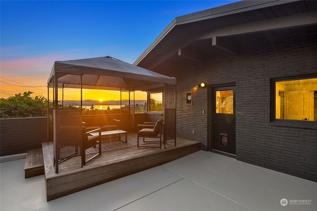 a view of balcony with chairs