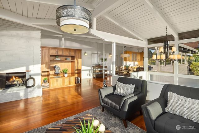 a living room with furniture and a table