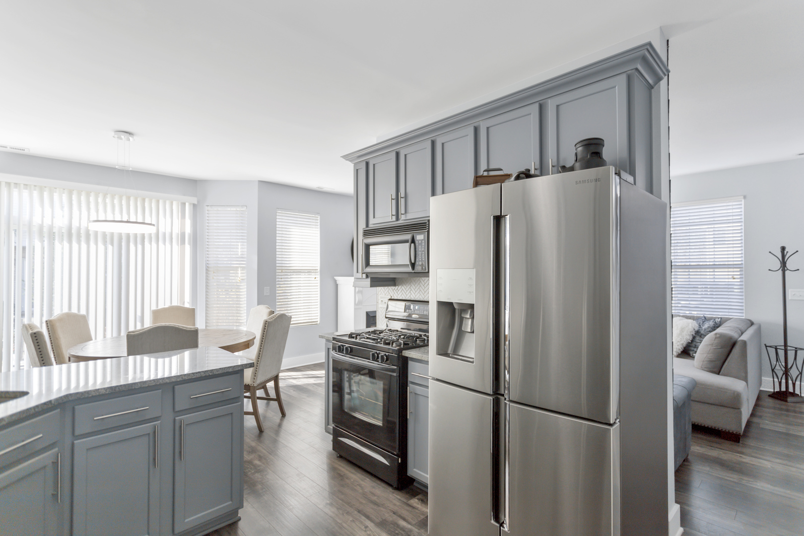 1420 Millbrook Drive Algonquin, IL 60102 - Photo 13 of 28 a kitchen with stainless steel appliances granite countertop a refrigerator and a sink
