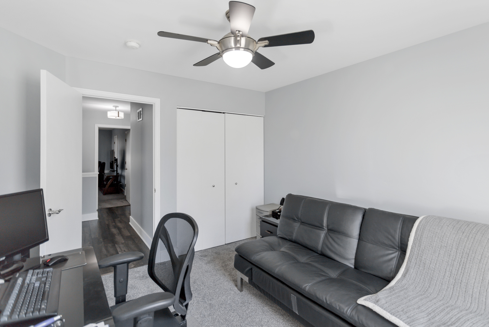 1420 Millbrook Drive Algonquin, IL 60102 - Photo 23 of 28 a living room with furniture a flat screen tv and a potted plant