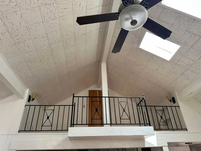 a kitchen with a cabinets and window