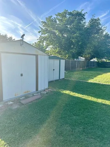 a view of outdoor space with deck and furniture