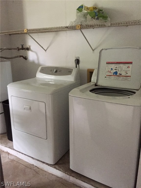 18566 Wisteria Road Fort Myers, FL 33967 - Photo 11 of 15 a utility room with dryer and washer