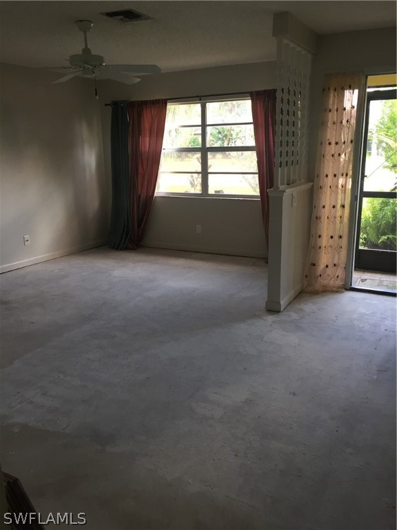 18566 Wisteria Road Fort Myers, FL 33967 - Photo 6 of 15 an empty room with windows