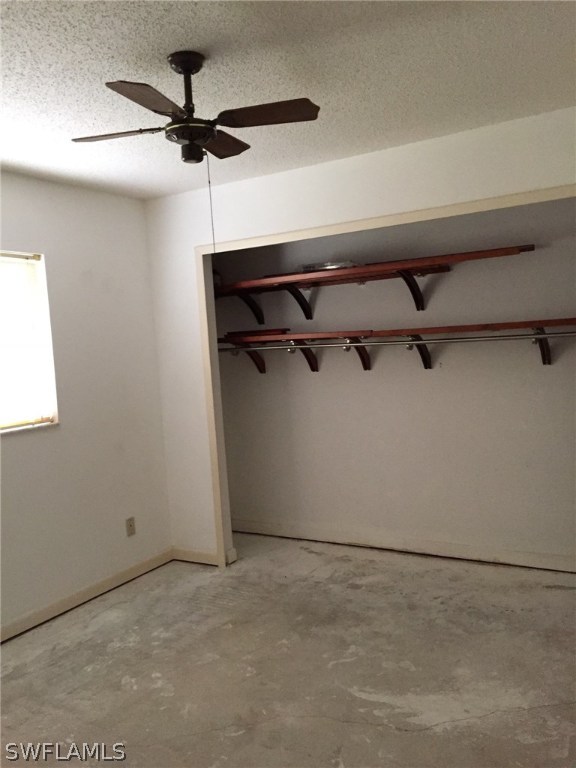 18566 Wisteria Road Fort Myers, FL 33967 - Photo 7 of 15 a view of a room with a ceiling fan