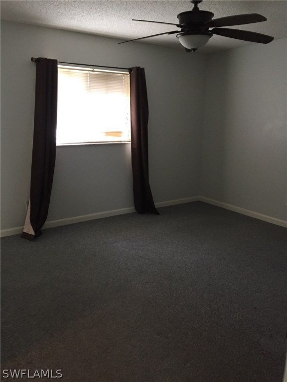 18566 Wisteria Road Fort Myers, FL 33967 - Photo 10 of 15 an empty room with a window