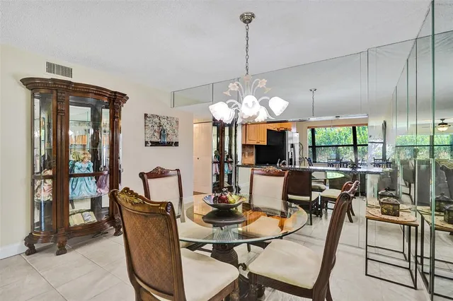 a view of a bathroom with a glass door shower