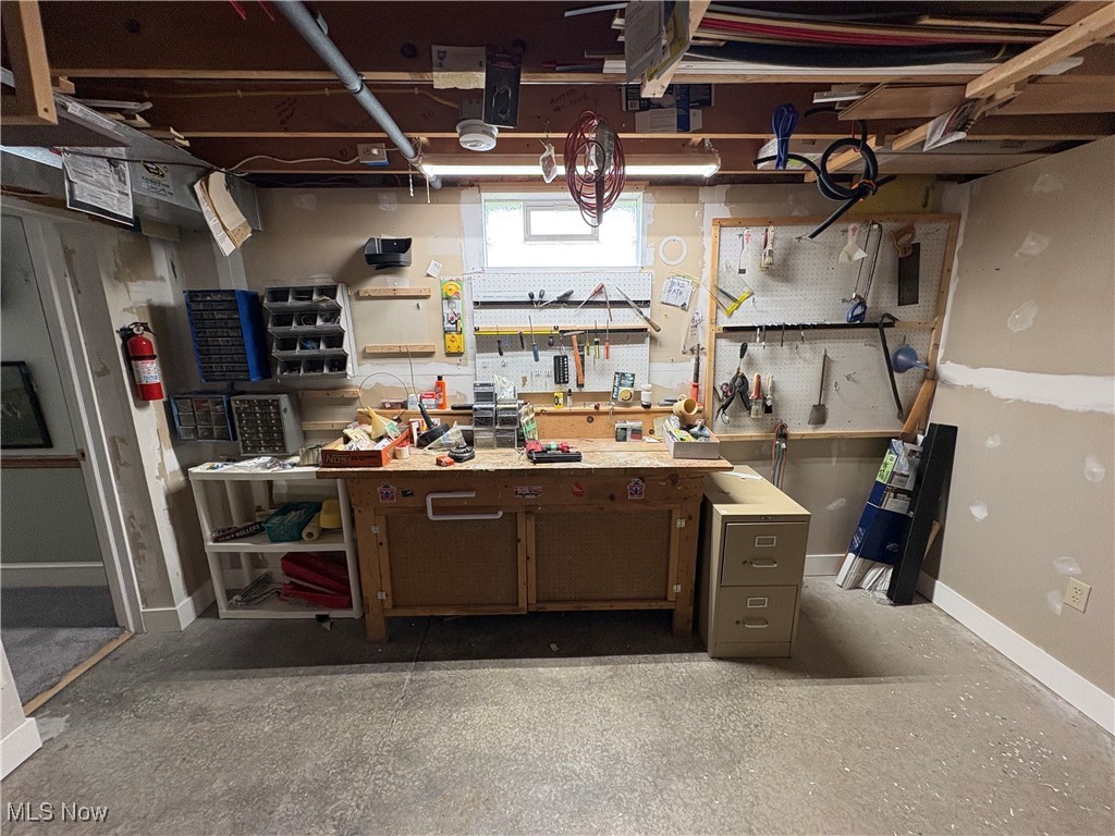 9220 Cherry Road Vermilion, OH 44089 - Photo 27 of 41 Basement with a workshop area